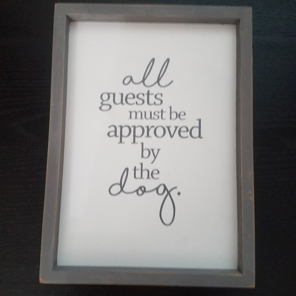 "All guests must be approved by the dog" wall hanging